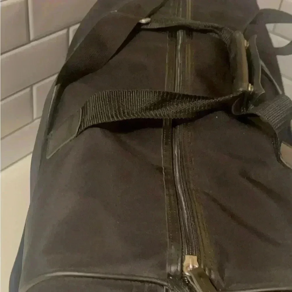 Escoda large travel bag waterproof, long adjustable straps fit a lot of stuff